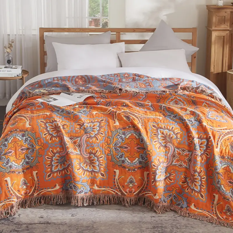 Bedding set on a bed: patterned coverlet with white pillows